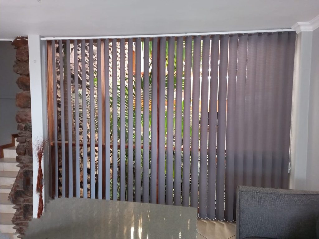 Made-to-measure vertical blinds installed on large windows
