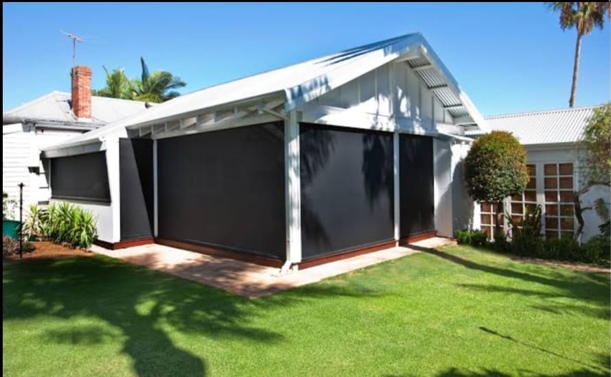 Out Door roller blinds installed - entertainment area - daytime view