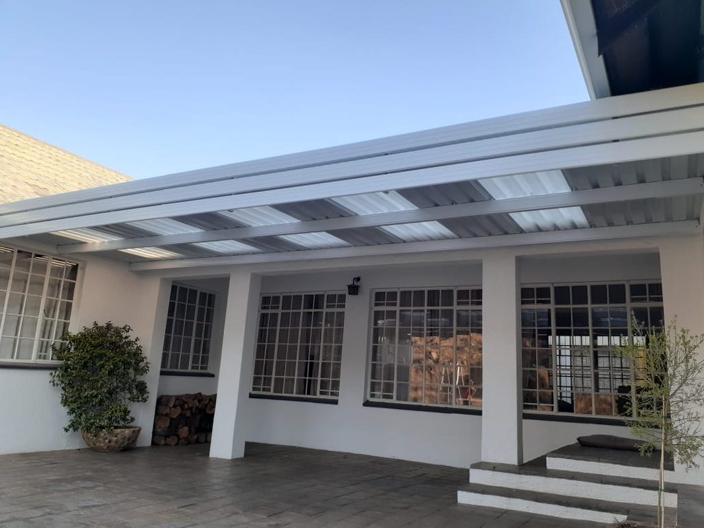 Fixed awning installed over patio